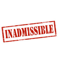 red letters that read inadmissible