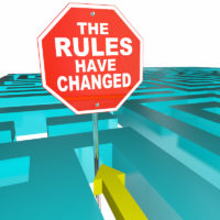 The Rules Have Changed Stop sign with puzzle maze game in background The Rules Have Changed Stop sign with puzzle maze game in background