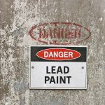 red, black and white Danger, Lead Paint warning sign