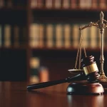 close up of wooden gavel and scales of justice, judge, law banner